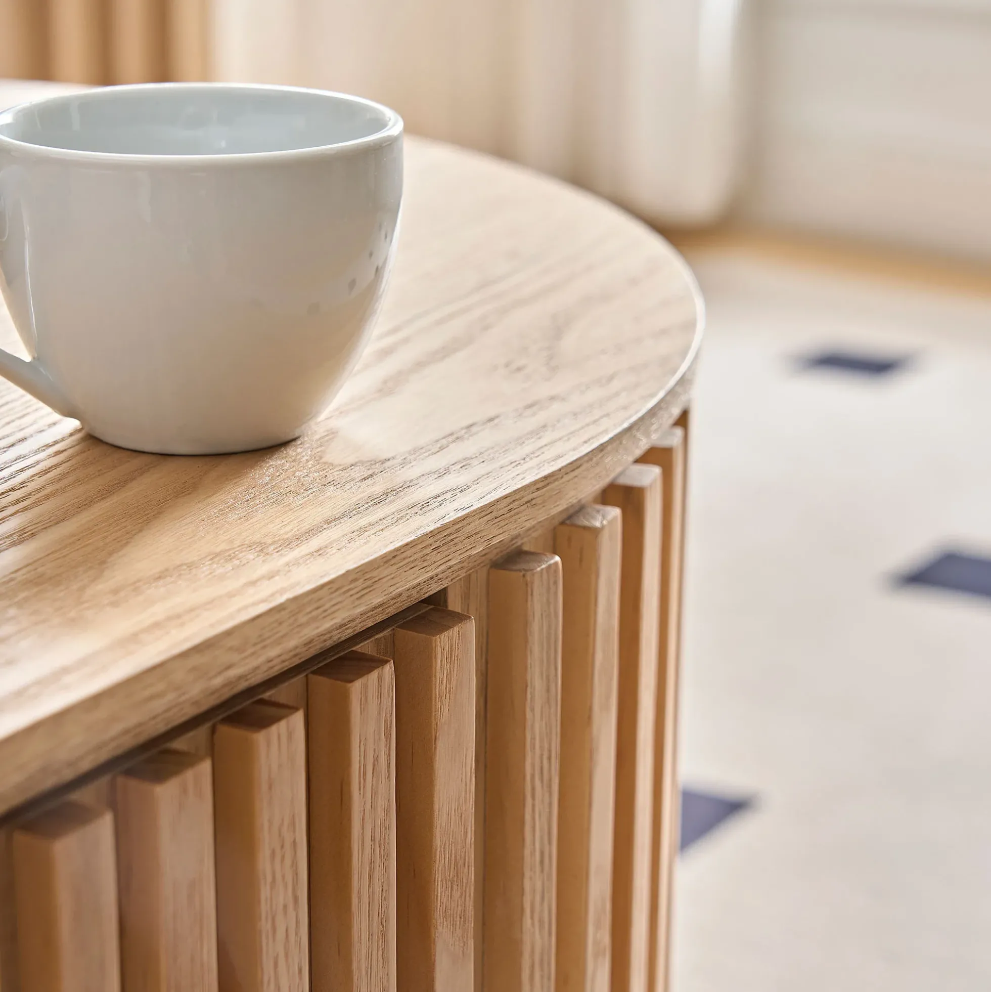 Reeded Oval Wood Coffee Table With Drawer